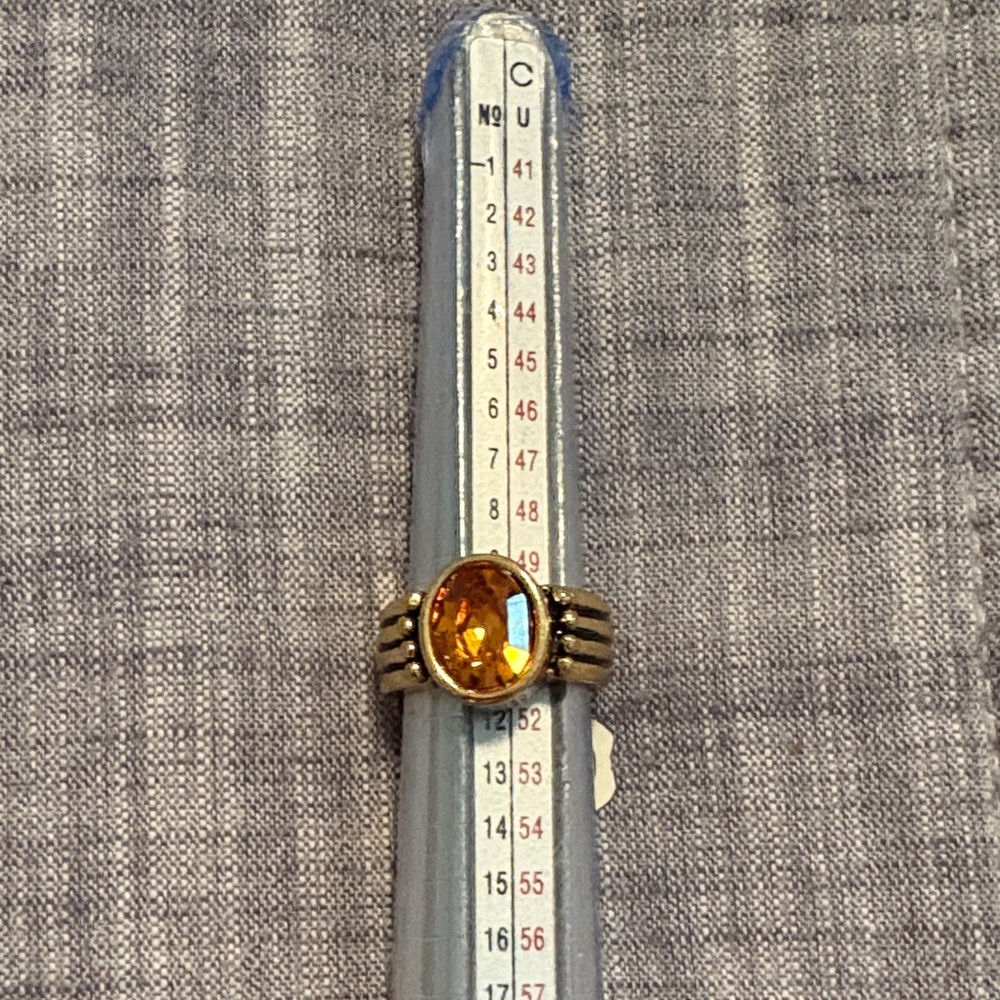 Elegant Gold Ring with Orange Gemstone